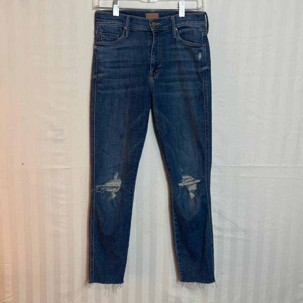 Mother Frayed and holy jeans